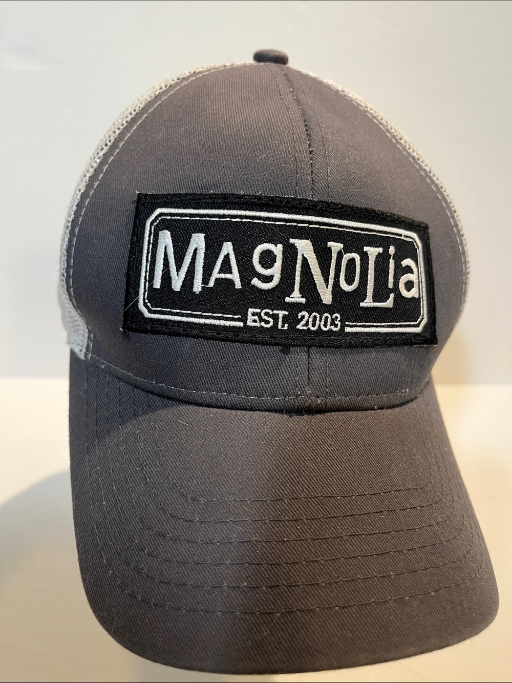 Magnolia Black and White Mesh Logo Trucker Cap